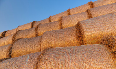orange stacks from the sun during sunset at dusk