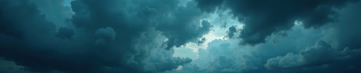 Fototapeta premium Darkening sky with clouds gathering ominously, stormy weather, turbulent skies, foreboding