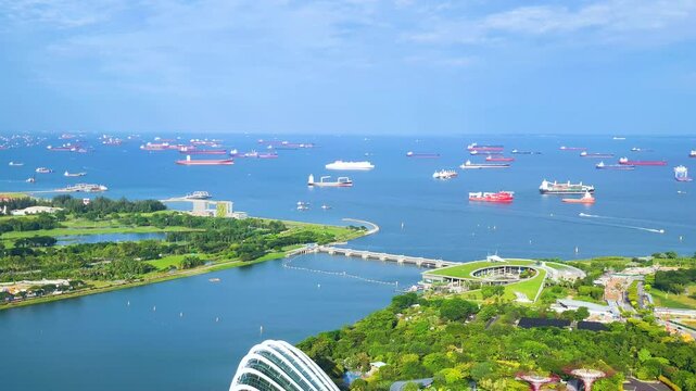Aerial view of Marina Bay, Marina Barrage and Garden By the Bay. 4K quality video of cityscape at Singapore