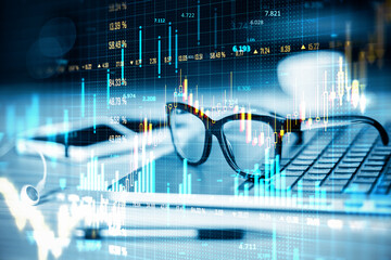 Financial graph with candlesticks and data overlays on laptop and glasses.