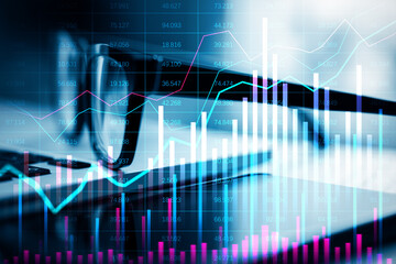 Financial data graph overlayed on blurred workspace background with glasses and keyboard, reflecting upward trends and market growth.