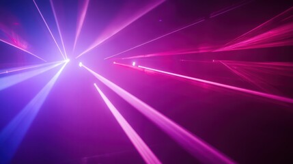 Abstract purple and blue laser beams converging in a dark space.