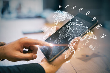 Digital representation of global finance and currency exchange displayed on a smartphone screen, featuring holographic world map overlay.