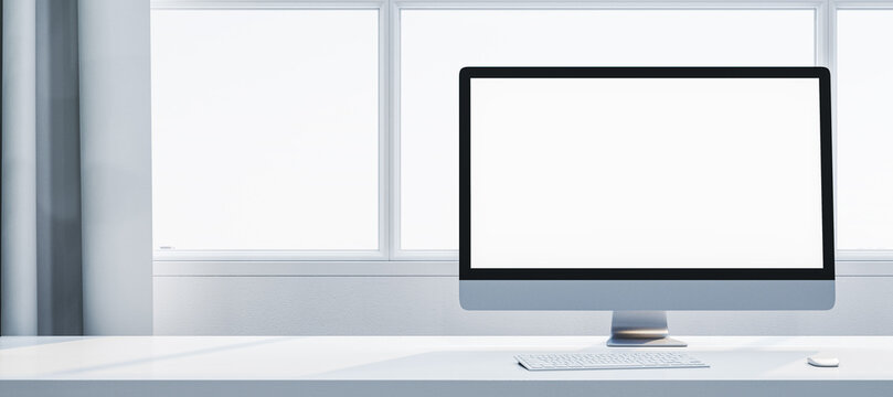 Minimalist desktop setup with blank computer monitor on white desk near large windows in a bright modern office interior. 3D Rendering - Powered by Adobe
