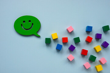 Speech bar with a smiley and blocks. Positive emotions.