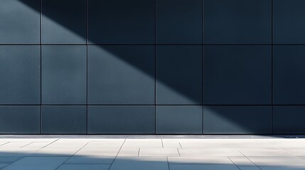 Tiled dark wall and light floor.
