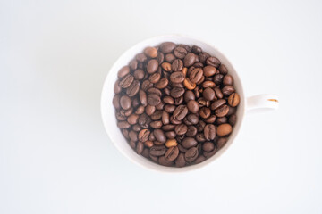 coffee espresso beans in a cup