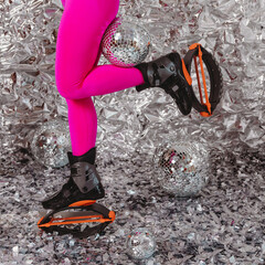 Woman legs in pink leggins with shoes for kangoo jumping