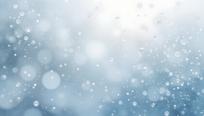 Snowflakes gently falling on a pristine snowy ground, with soft sun rays filtering through trees in the blurred background, creating a serene and magical winter wonderland atmosphere.