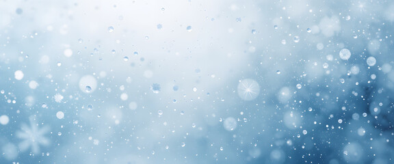 Fototapeta premium Snowflakes gently falling on a pristine snowy ground, with soft sun rays filtering through trees in the blurred background, creating a serene and magical winter wonderland atmosphere.