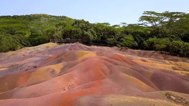 Chamarel Seven Colored Earth Geopark in Mauritius Island. Colorful panoramic landscape about this volcanic geological formation Chamarel Seven Colored Earth Geopark in Riviere noire district.