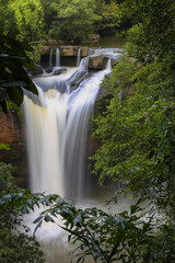 Obraz premium Haew Suwat Waterfall is a single-tiered waterfall, not very large, about 25 meters high, with a lot of water during the rainy season. It is located in Khao Yai National Park, Korat.