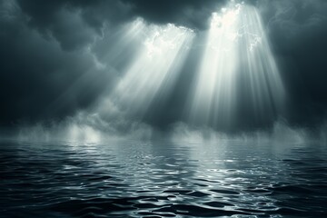 Fototapeta premium Mysterious seascape features dark clouds and beams of sunlight piercing through during twilight hours