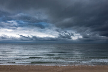 Aerial view to a beautiful clouds over empty beach

