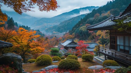 Obraz premium A soft mist rises from the valley, creating a serene and peaceful atmosphere, while the sun casts a warm glow on the colorful foliage