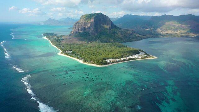 Aerial view of Mauritius island panorama and famous Le Morne Brabant mountain, beautiful blue lagoon and underwater waterfall. Le Morne Brabant peninsula and Underwater Waterfall, Mauritius.