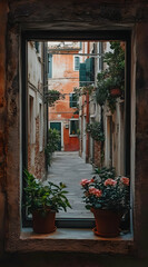 A serene view of a narrow alley adorned with plants and vibrant walls.