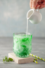 Homemade Cold Dirty Soda with  Coconut Cream and Ice. Trendy Alcohol free mocktail