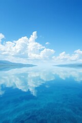 Fototapeta premium there is a large body of water with a sky and clouds in the background