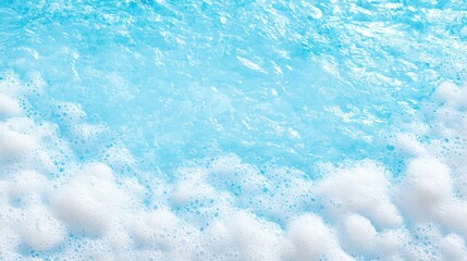 White foam on light blue water surface.
