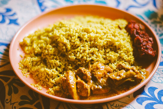Chicken Donne Biriyani recipe is a local hit popular in eateries and restaurants around Bangalore. The word 'Donne' means cups that are made using dried plantain leaves.