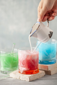 Homemade Cold Dirty Soda with  Coconut Cream and Ice. Trendy Alcohol free mocktail