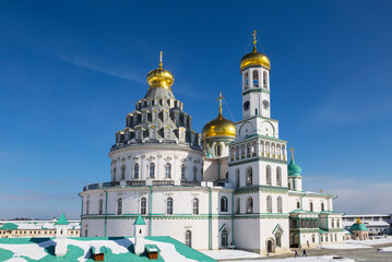 Resurrection Cathedral of the New Jerusalem Stavropegic Monastery, dome of rotunda  and bell tower in winter. Istra, Moscow Region, Russia