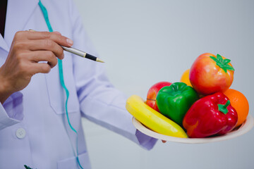 Asian male nutritionist specializing in promoting healthy eating habits, providing nutritional advice, creating meal plans, and helping individuals achieve optimal health through balanced nutrition.