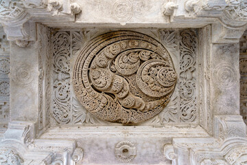 India. Rajasthan state. Ranakpur. Chaumukha Temple, also called the Ranakpur Temple dedicated to Lord Adinatha. White marble carved ceiling