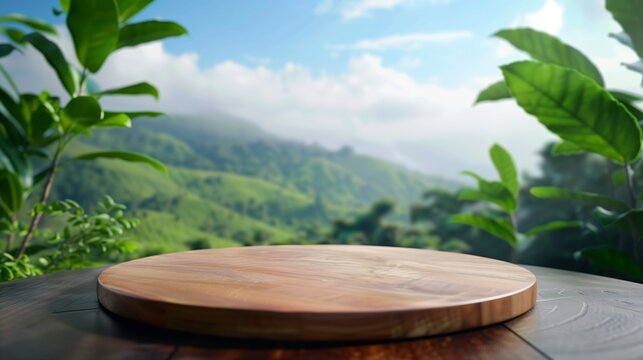 Circle wooden table top with blurred tea plantation landscape against blue sky and blurred green leaf frame Product display concept natural background
