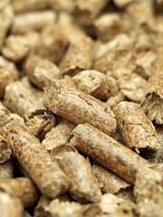 Natural wooden pellets. Pellet fuels, renewable energy, compressed organic material