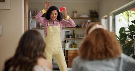 Woman, acting and games in home with friends for entertainment, fun and bonding together. Female person, playing pantomime and party for weekend, social gathering or activity in living room at house