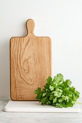 Wooden kitchen board with oak texture on white marble surface