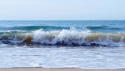 Fototapeta premium Peaceful Ocean Waves Crashing on Sandy Beach