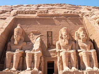 Four statues of Ramesses II in front of the Great Temple of Ramesses II, Abu Simbelm, Egypt -...