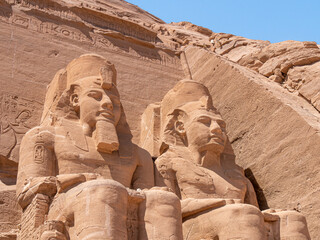 Two statues of Ramesses II in front of the Great Temple of Ramesses II, Abu Simbel, Egypt - Low...