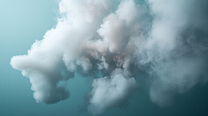 Obraz premium Fluffy white clouds floating in a serene blue sky during daytime.