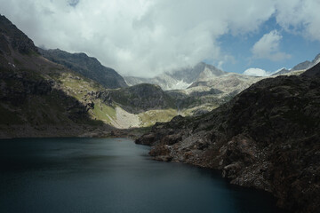 Naklejka premium Beautiful mountain landscape in the Northern Italy, in the Camonica Valley during a cloudy day