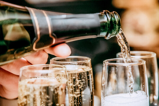 Glass glasses of champagne, people celebrating an important event, festive toast