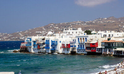 View of traditional greek village with white houses on Mykonos Island, Greece