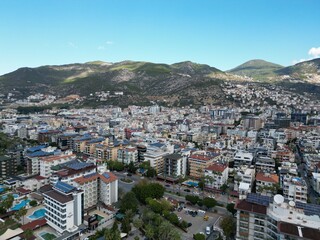 Fototapeta premium Sea resort drone view mountain forest houses