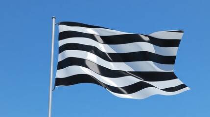 Black and White Striped Flag Against Clear Blue Sky
