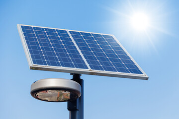 Solar power street lamp, Solar street light post led system in modern green city metro road.