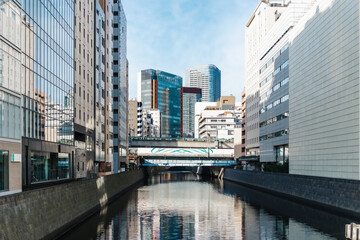 Obraz premium Modern metro city building around clean canal river, Environment eco friendly urban in Japan.