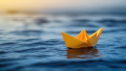 Yellow paper boat floating on ocean water serene seascape nature calm environment peaceful viewpoint