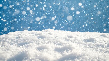 Naklejka premium Snow gently falling against a soft background with a blank area at the bottom, ideal for adding holiday greetings or custom text