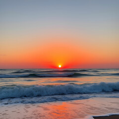 Fototapeta premium Sunset over an sea with waves breaking on the beach