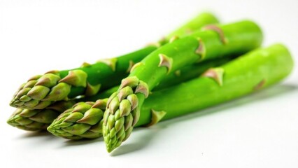 Close-Up of Fresh Asparagus Spears Isolated on White Background, showcasing freshness and natural texture, culinary and healthy lifestyle concepts. National Nutrition Month. World Vegan Day.