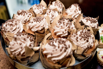 Sweet pastry dessert on glass plate, pastry cake confectionery shop restaurant