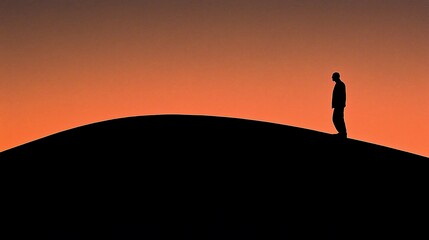 Solitary figure silhouetted against a vibrant sunset on a hill.